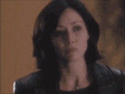 Person wearing a black leather jacket.