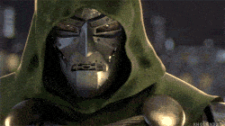 Menacing figure in green cloak