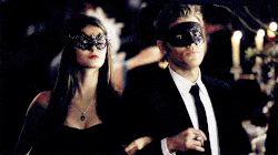 Elegant couple at a formal event.