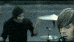 Band performing with drums and energy