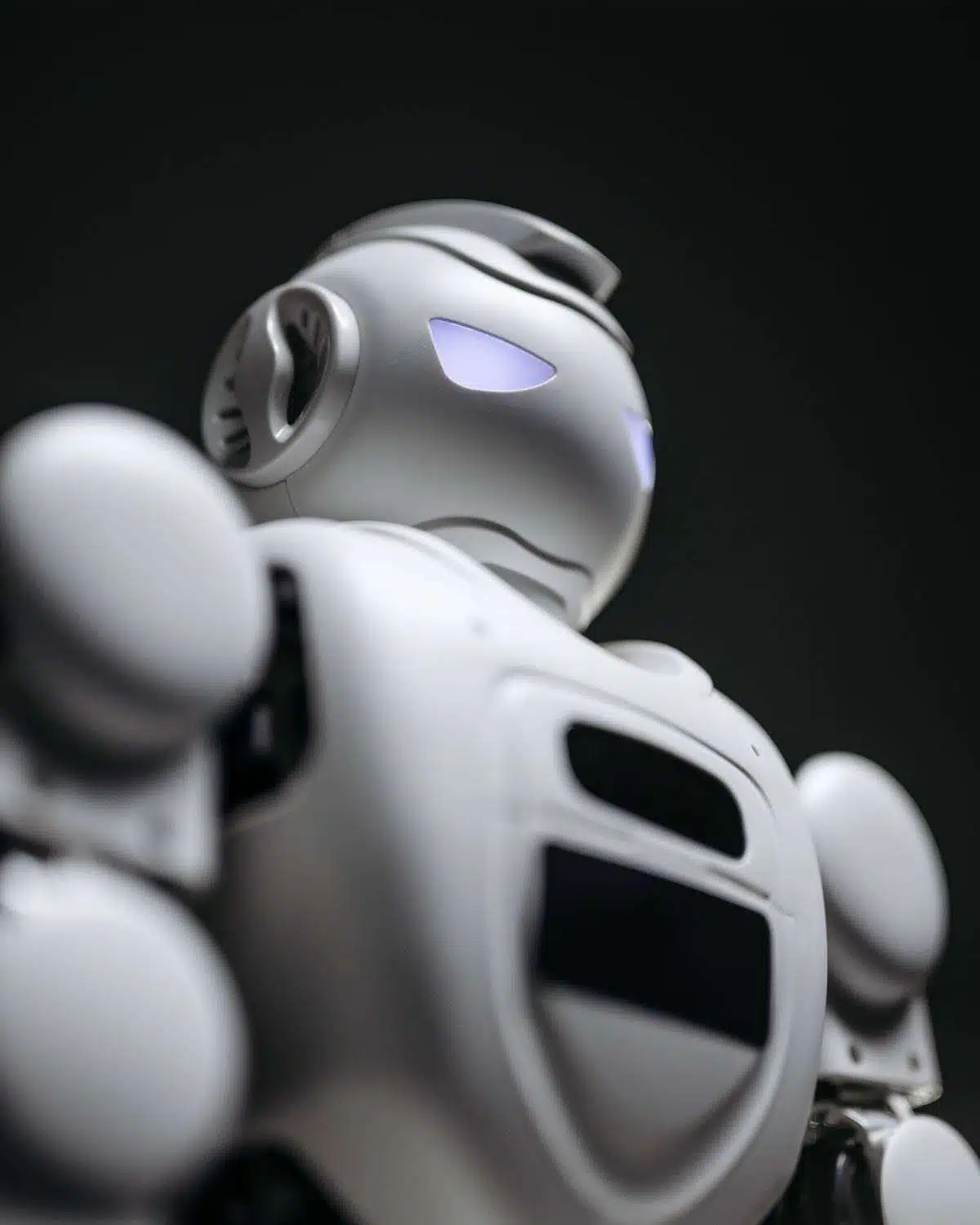 White robot with glowing eyes