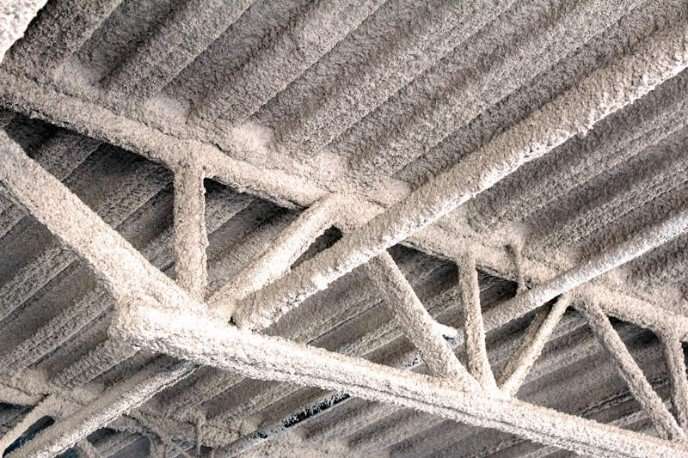 Covered ceiling with white texture.