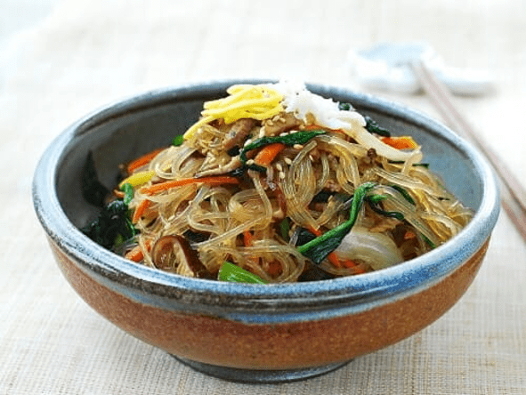 Colorful bowl of stir-fried noodles