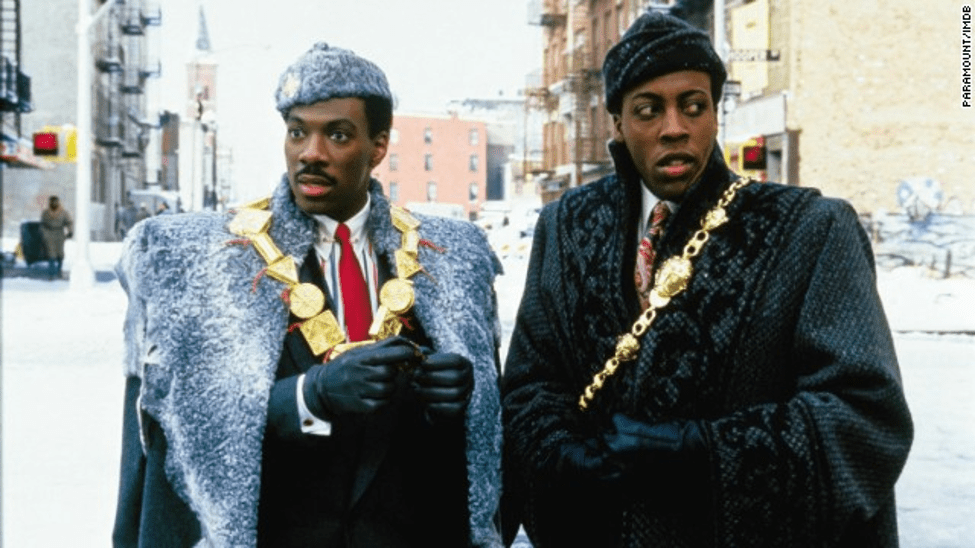 Two men in winter attire outdoors.